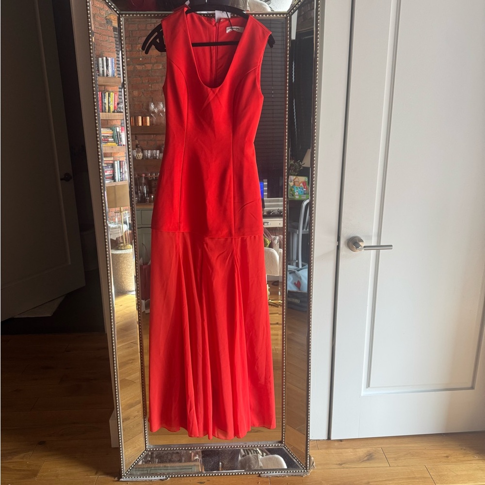 Never been worn new with tags. Great for wedding guests! Bought for $150